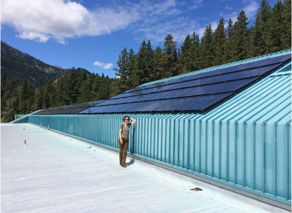 Photo of Ellen Lamiman with solar panels