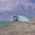 Post-construction seeding on the flanks of Burch Mountain in 2006.  Today, this site supports abundant native vegetation.