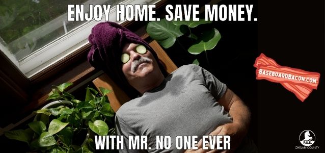 Enjoy home. Save Money. With Mr. No One Ever. Man with cucumber slices over eyes and towel wrapped on hair relaxing in front of window.Baseboard Bacon