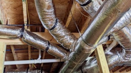 ducts on the ceiling of a crawl space