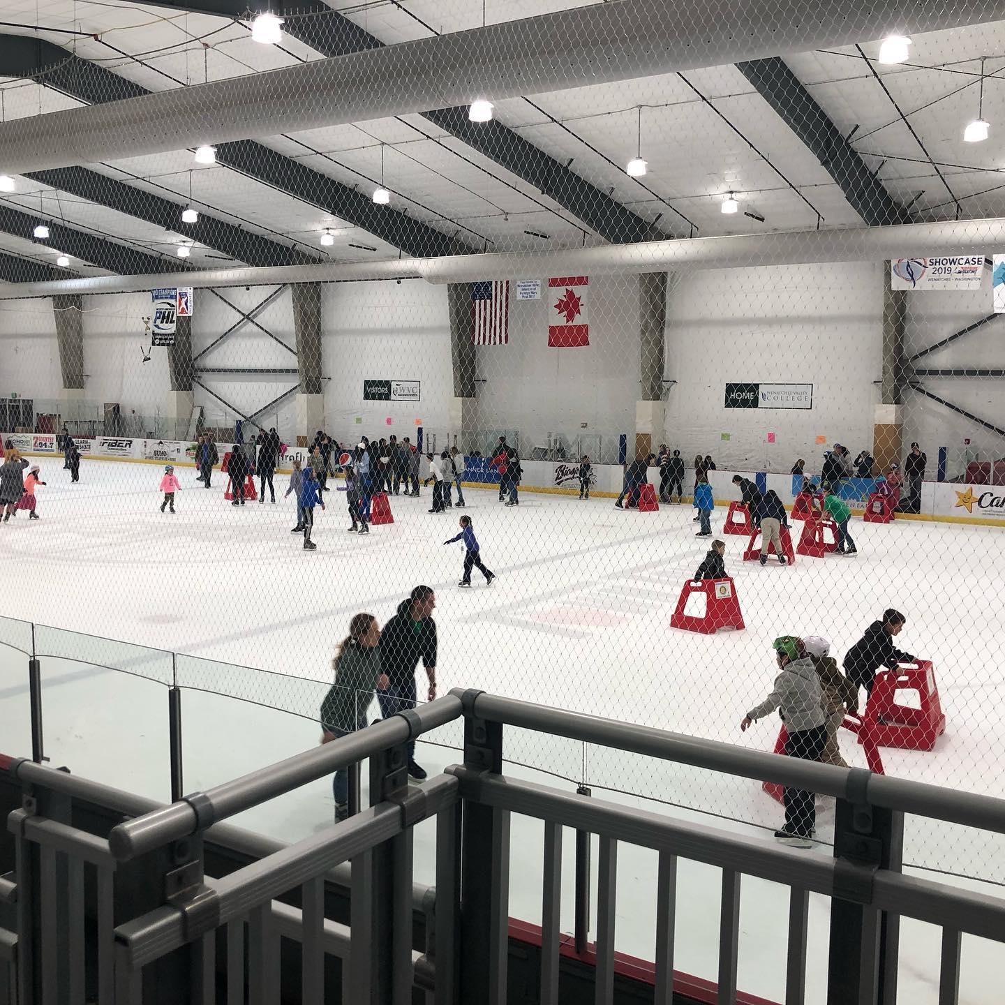 iFiber community ice rink at Town Toyota Center filled with skaters of all ages, pre-pandemic