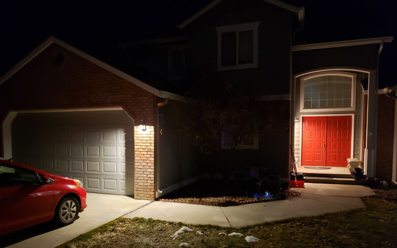 home entry and garage with focused LED lighting that avoids glare