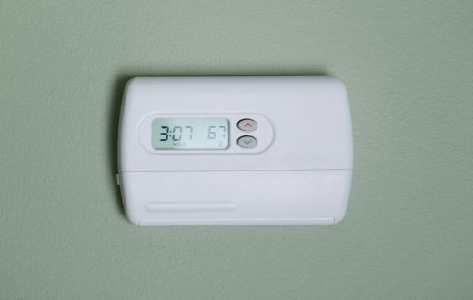 line voltage thermostat on wall