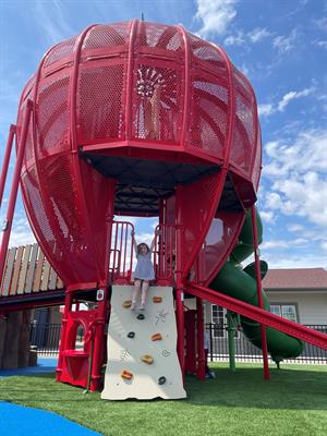 Riverfront park Joanna photo of girl on Apple Playground