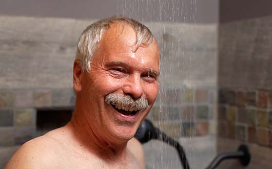 Mr. No One Ever smiles as he takes a cold shower