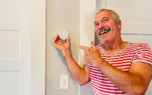 Mr. No One Ever points to his smart thermostat