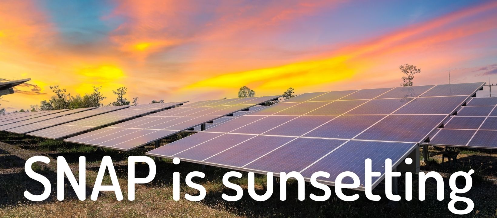 SNAP is sunsetting - background of solar panels with sunset