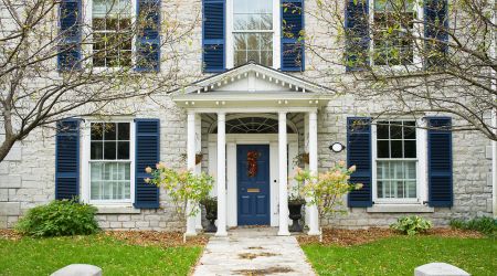 historic home with storm shutters