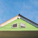 Attic ventilation near peak of gable home roof