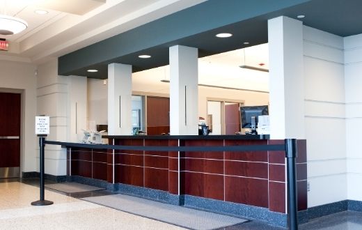 Empty bank lobby looking at teller stations