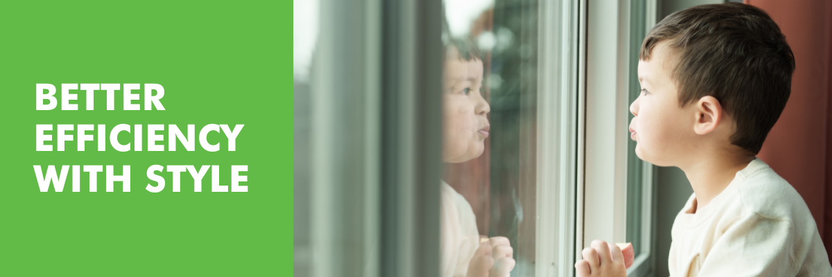 a young boy looks out a window with his reflection showing